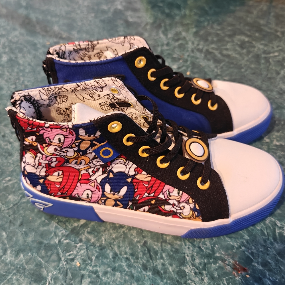 Blue and Black High-Top Sneakers with Vibrant Pattern